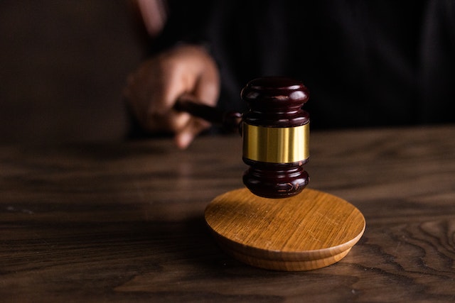 brown-wooden-gavel-on-brown-wooden-table