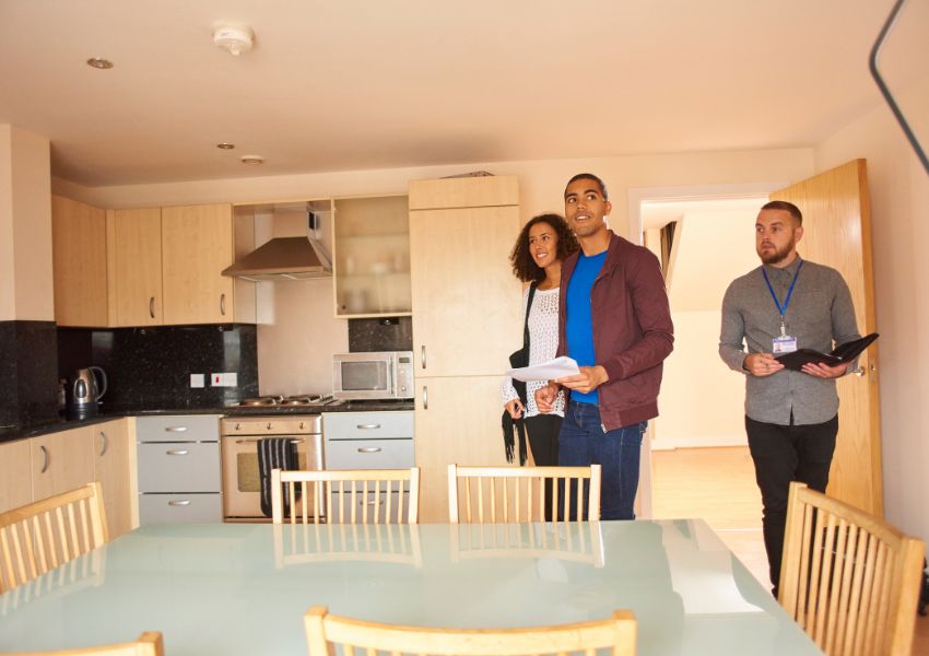 landlord-taking-potential-tenants-through-a-property-viewing